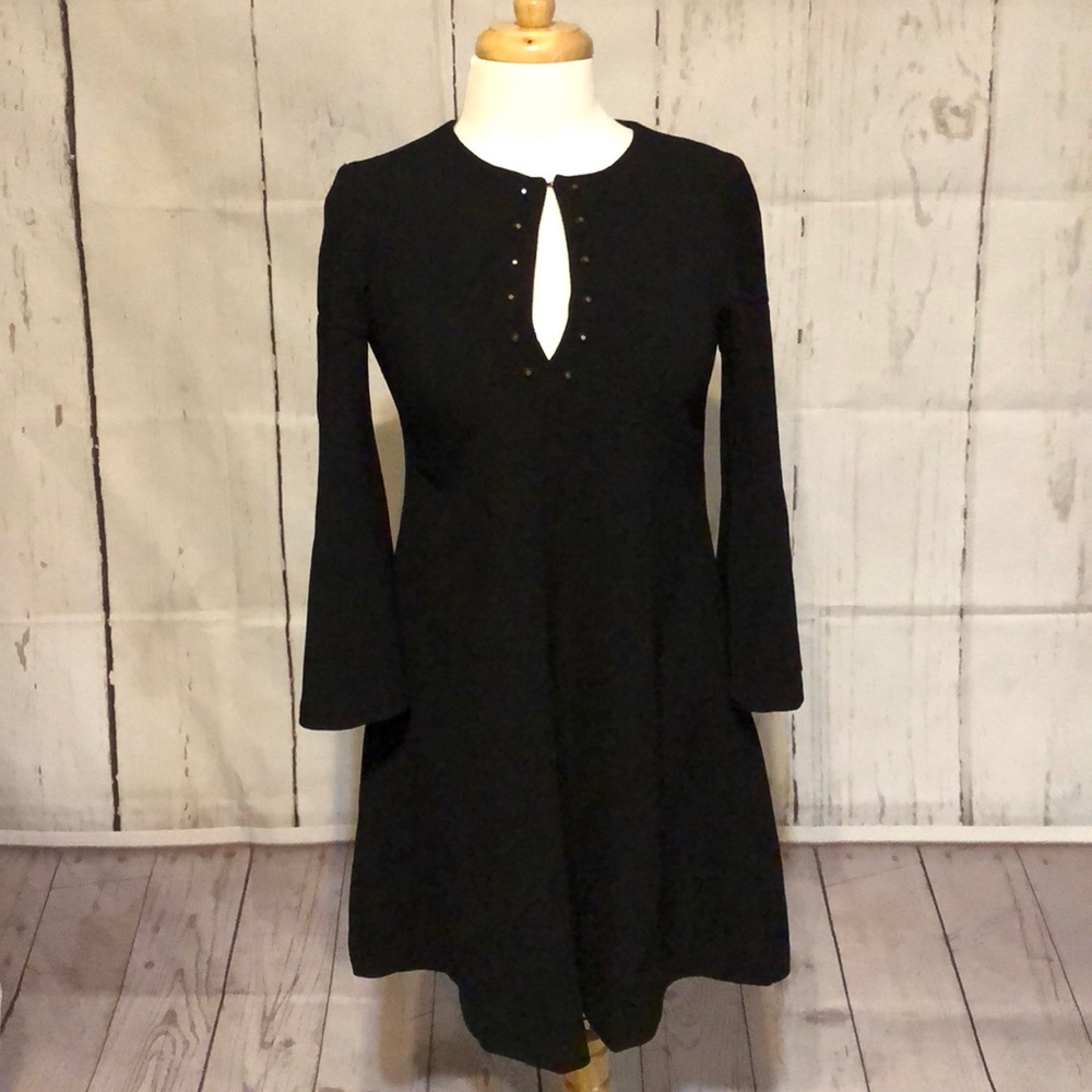Short black Gabby Skye dress with 3/4 bell sleeves